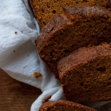 slices of sourdough pumpkin bread with cinnamon sugar topping