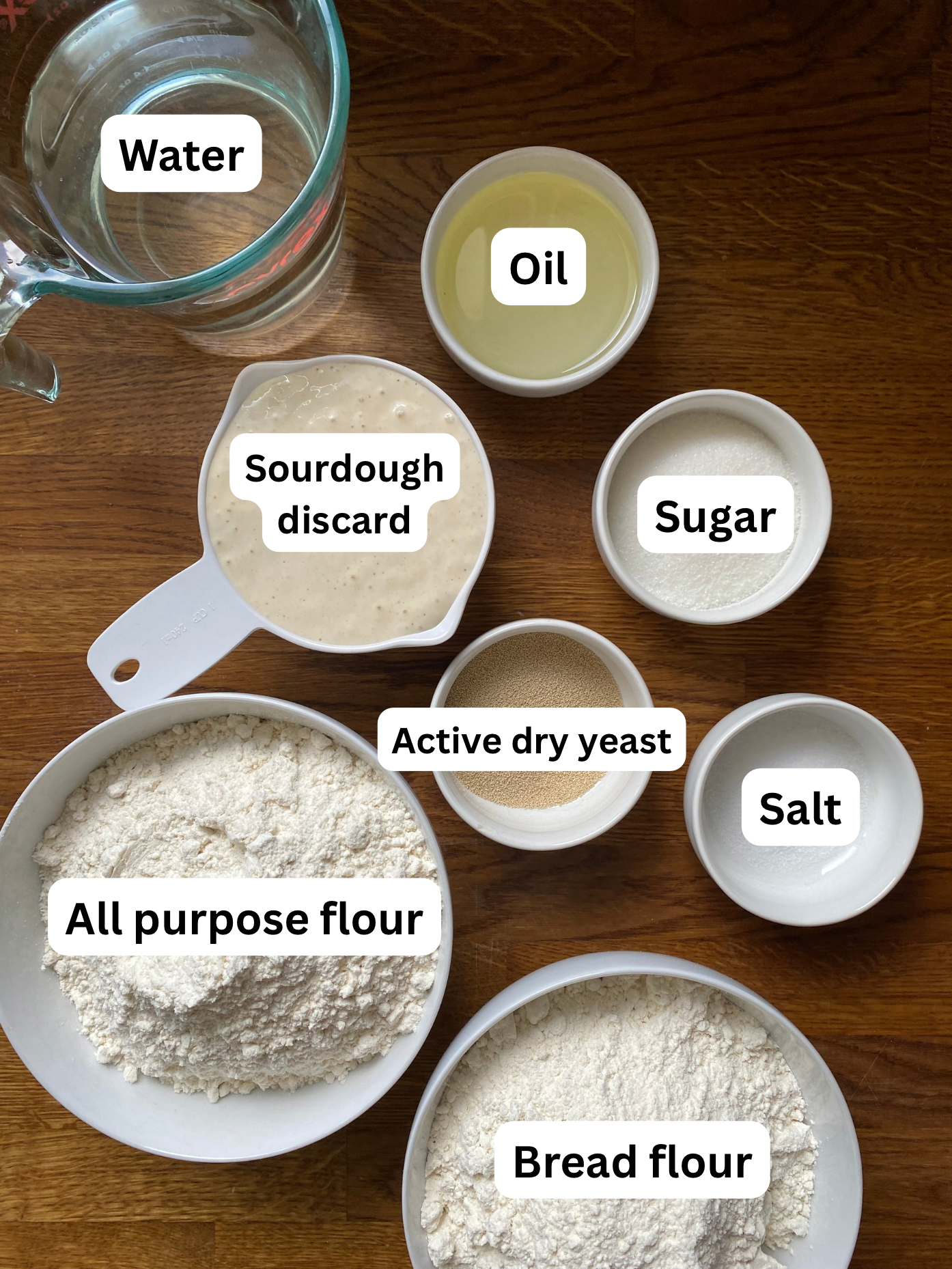 Ingredients to make sourdough discard hoagie rolls.