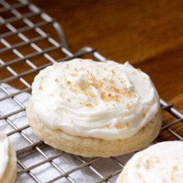close up of a very generously frosted sugar cookie