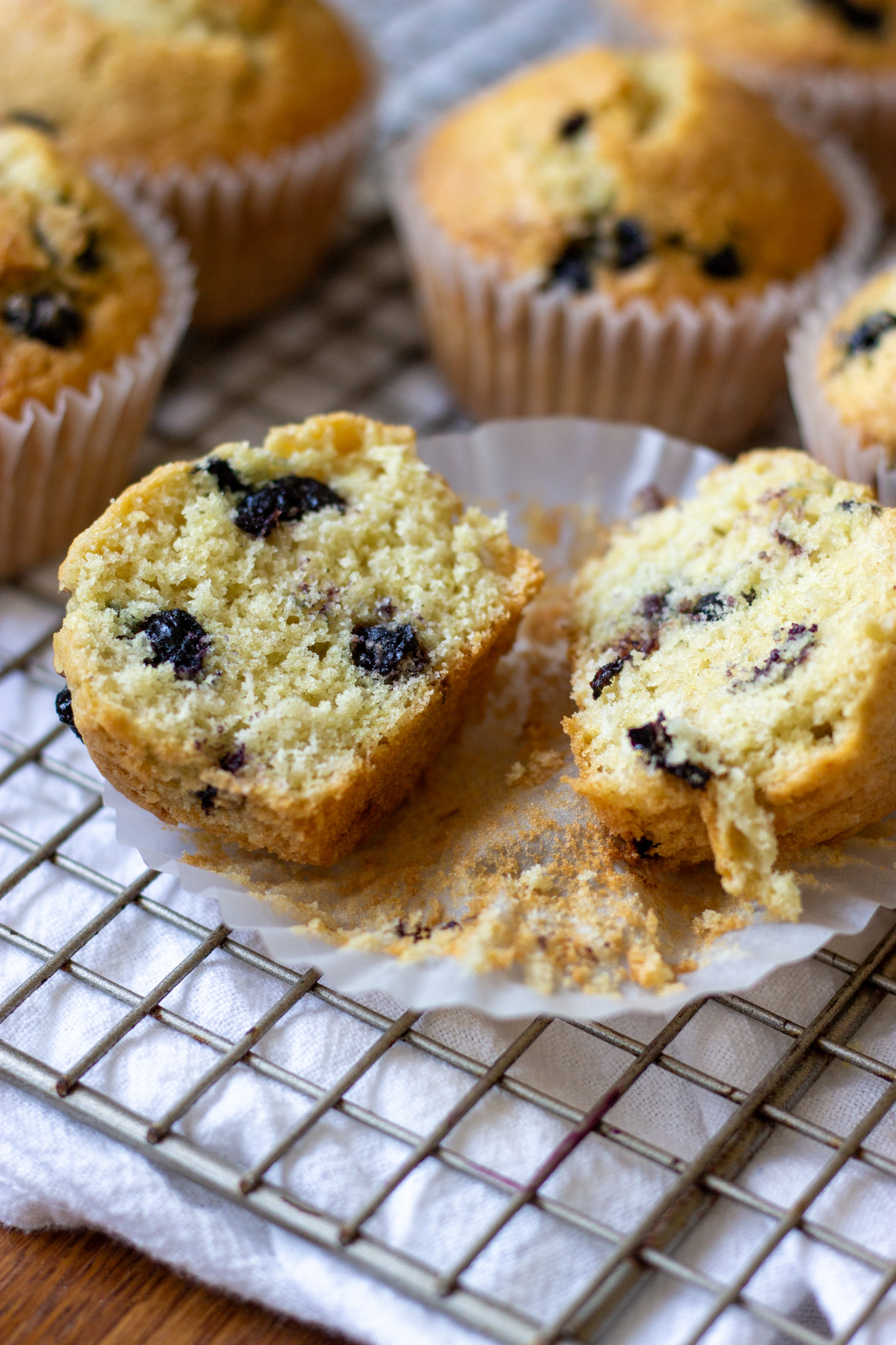 Close up of blueberry muffin cut in half.