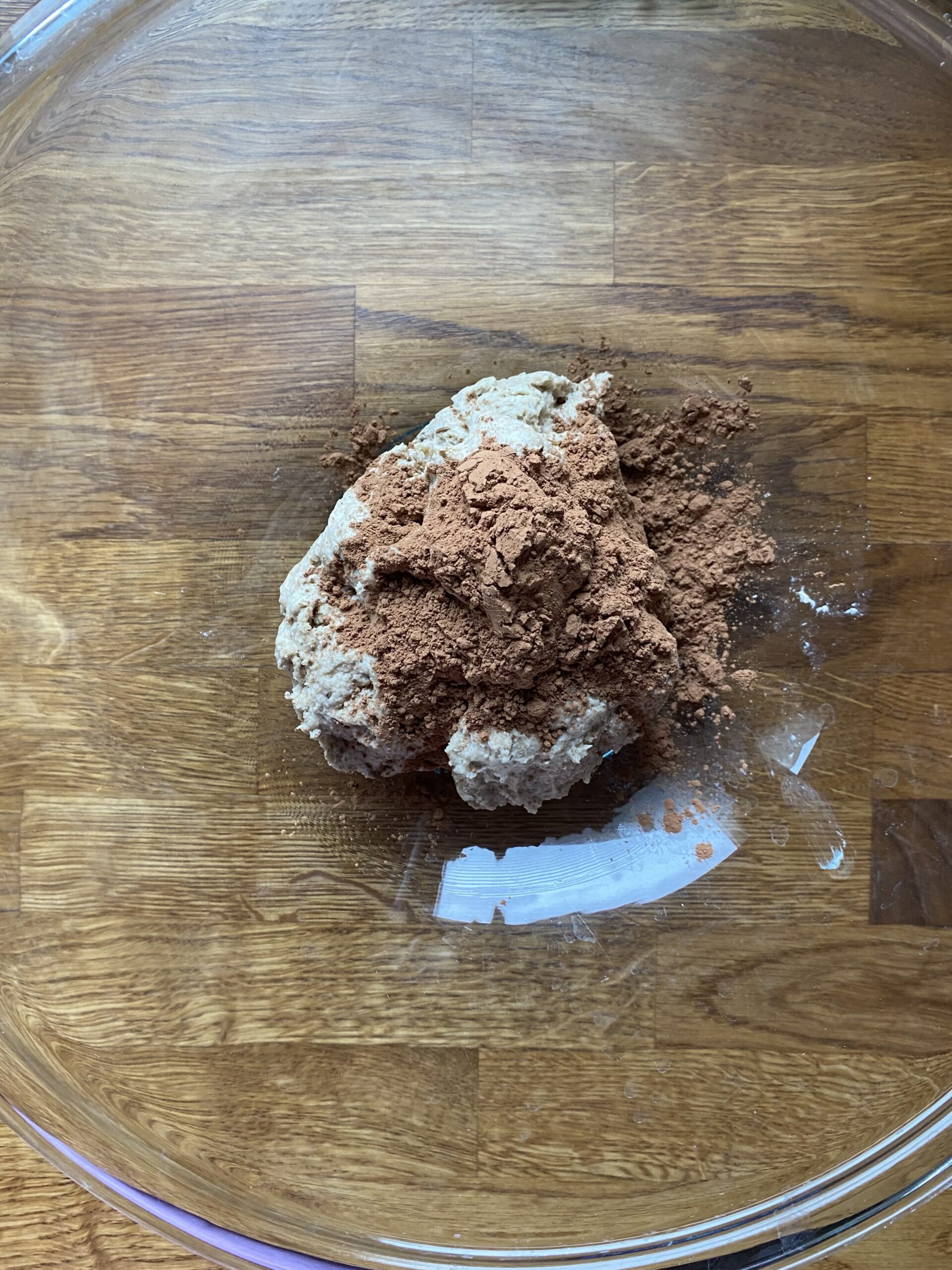 Light dough sprinkled with cocoa powder.