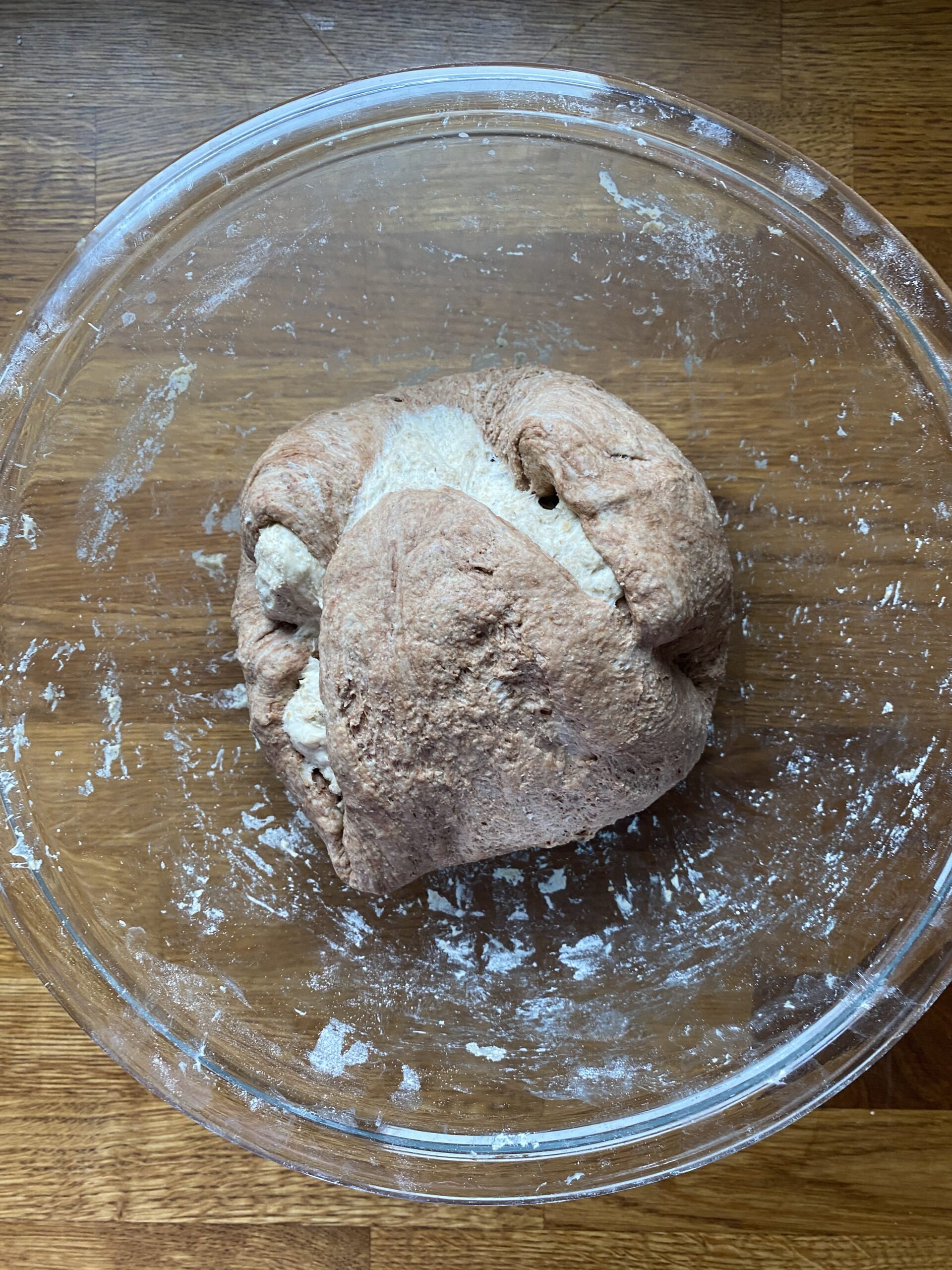 The light and dark doughs formed into a ball before doing stretch and folds.