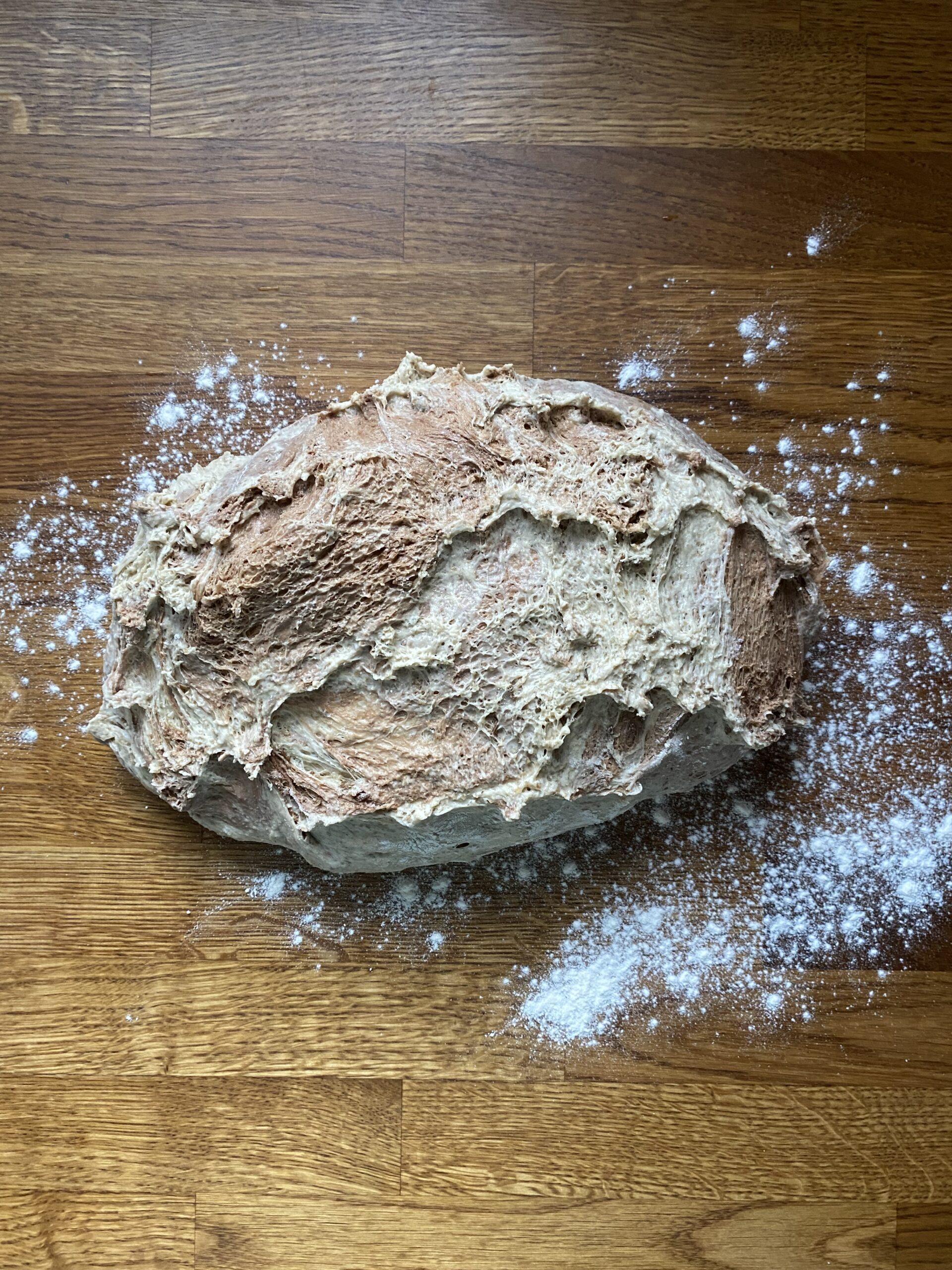 Marble dough on a lightly floured surface to shape in to a loaf.